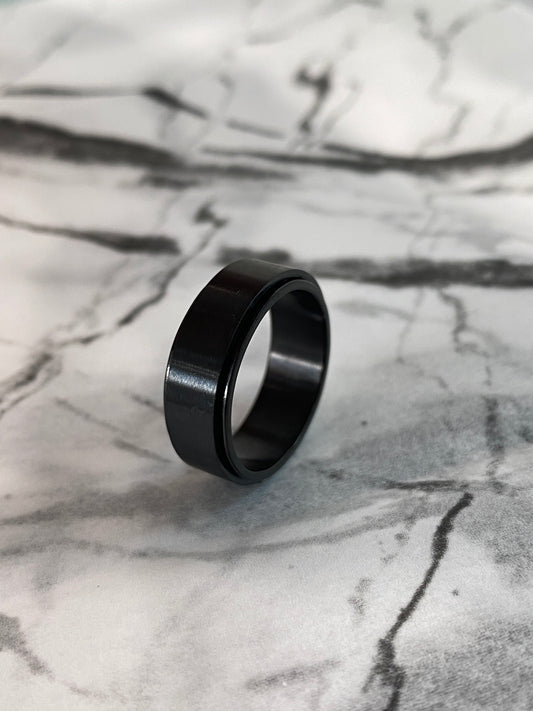 Sleek Spinning Black Ring